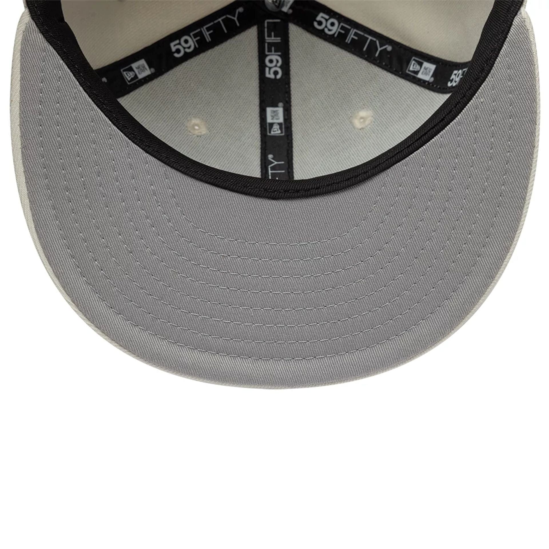 Pictured is this Hajime Sorayama X New Era 59FIFTY Fitted cap in Cream. 2