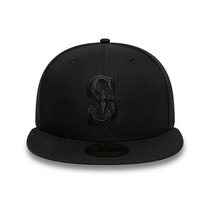 Seattle Mariners MLB Black On Black New Era 59FIFTY Fitted Cap, front view showing the black raised embroidered team logo on the centre front panel with matching visor and gold 59FIFTY size sticker on top of the visor.