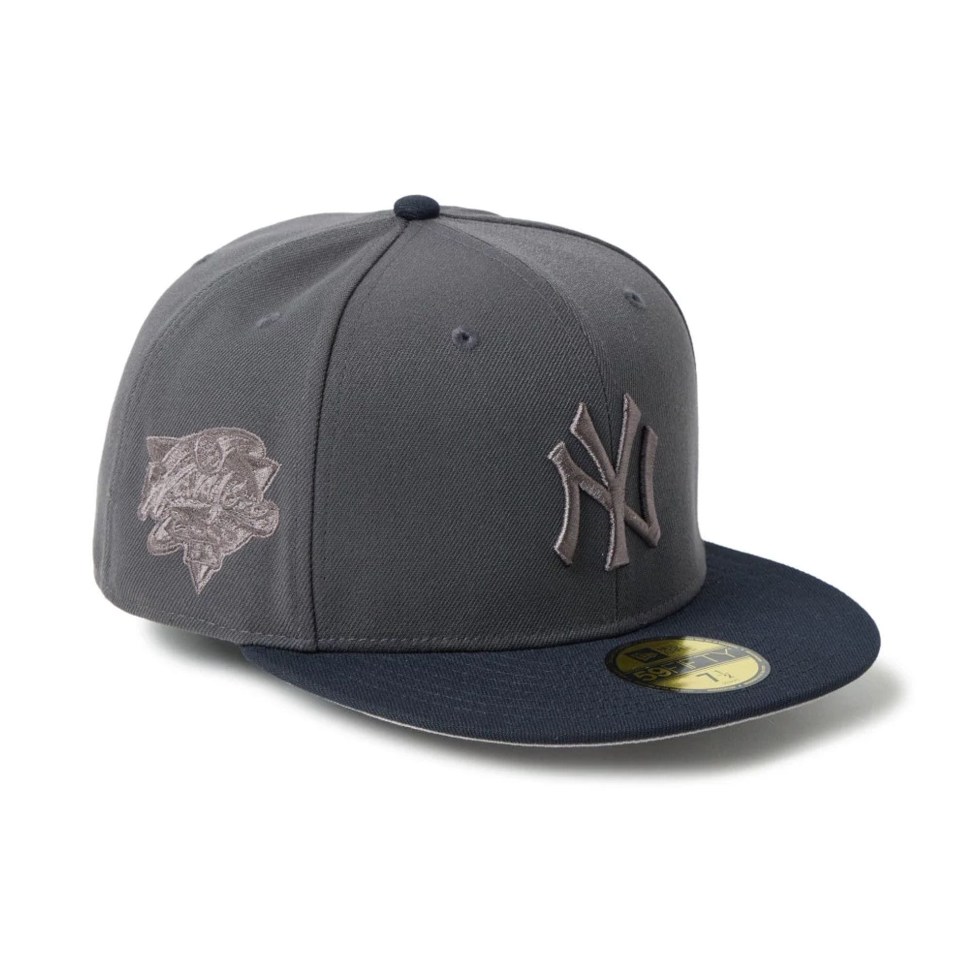 Pictured is this MLB New York Yankees 59FIFTY Fitted cap in dark grey. 1
