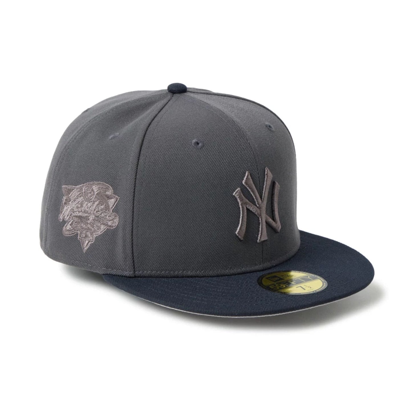 Pictured is this MLB New York Yankees 59FIFTY Fitted cap in dark grey. 1