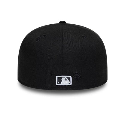 Pictured is this MLB Paisley Emblem New York Yankees 59FIFTY Fitted cap in black. 4