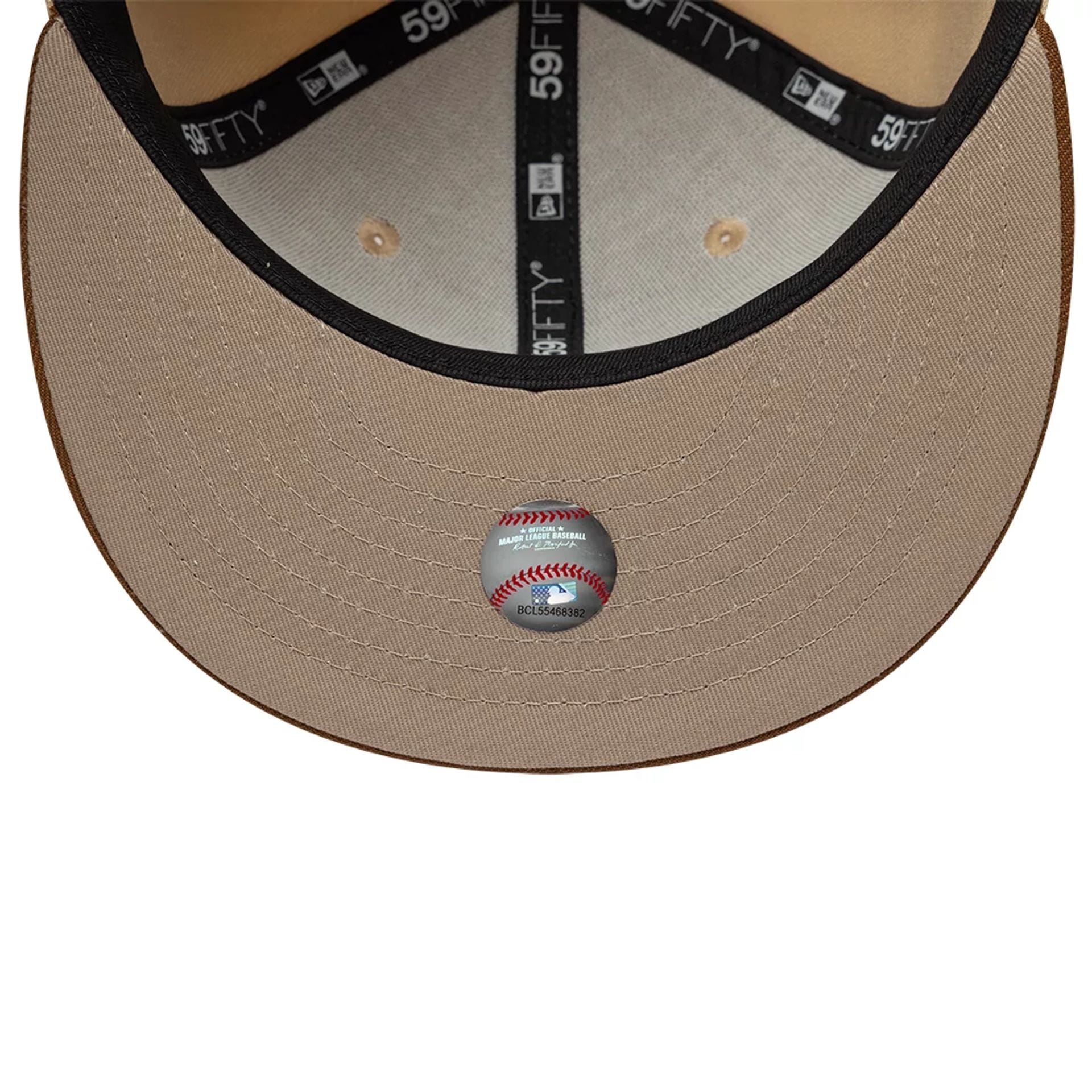 Pictured is this MLB Mocha Mousse New York Yankees 59FIFTY Fitted cap in light beige. 7