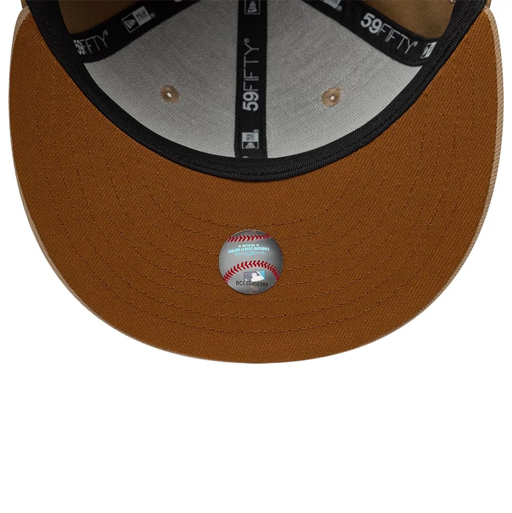 Pictured is this MLB Camo LA Dodgers 59FIFTY Fitted cap in beige. 2
