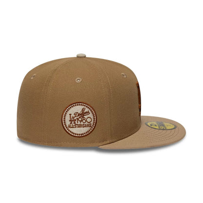 Pictured is this MLB Camo LA Dodgers 59FIFTY Fitted cap in beige. 5