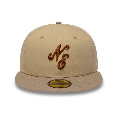 Pictured is this New Era Mocha Mousse 59FIFTY Fitted cap in light beige. 3
