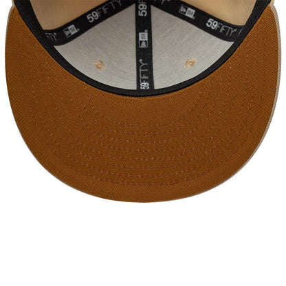 Pictured is this New Era Mocha Mousse 59FIFTY Fitted cap in light beige. 2