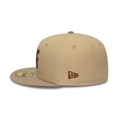 Pictured is this New Era Mocha Mousse 59FIFTY Fitted cap in light beige. 6