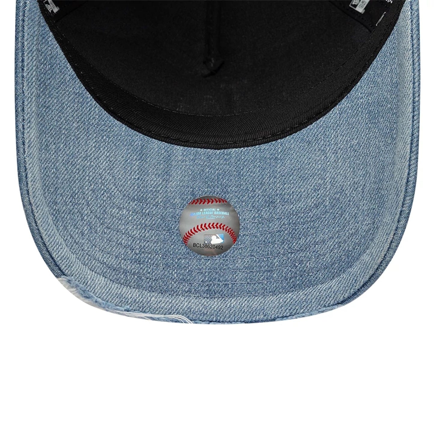 Pictured is this MLB Distressed Washed Denim LA Dodgers 9FORTY A-Frame Trucker cap in blue. 7