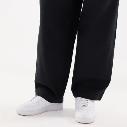 The model is wearing this New Era Balloon Leg Trousers in black. 7