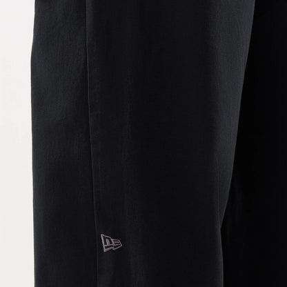 The model is wearing this New Era Balloon Leg Trousers in black. 4