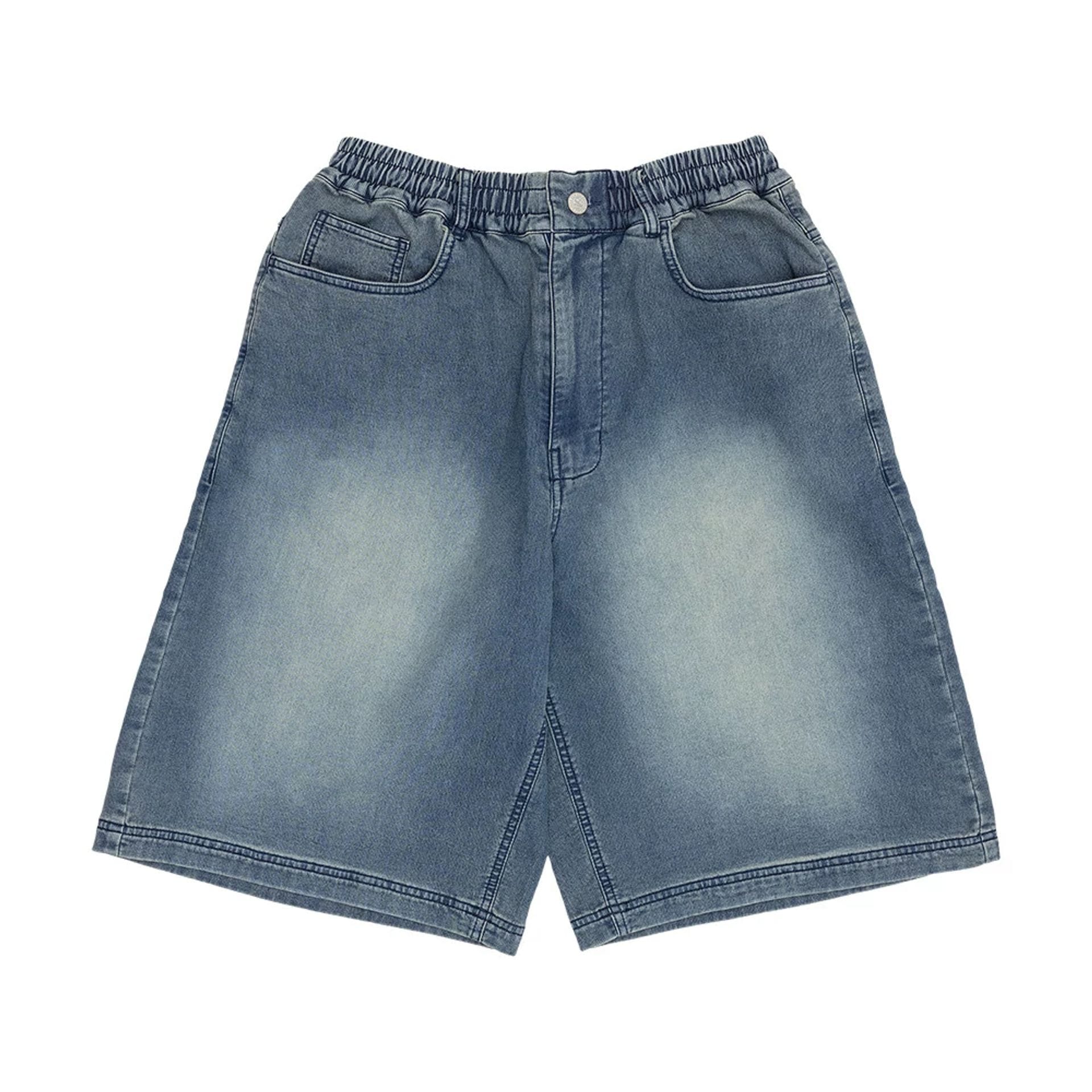 The model is wearing this New Era Washed Bermuda Shorts in blue. 1
