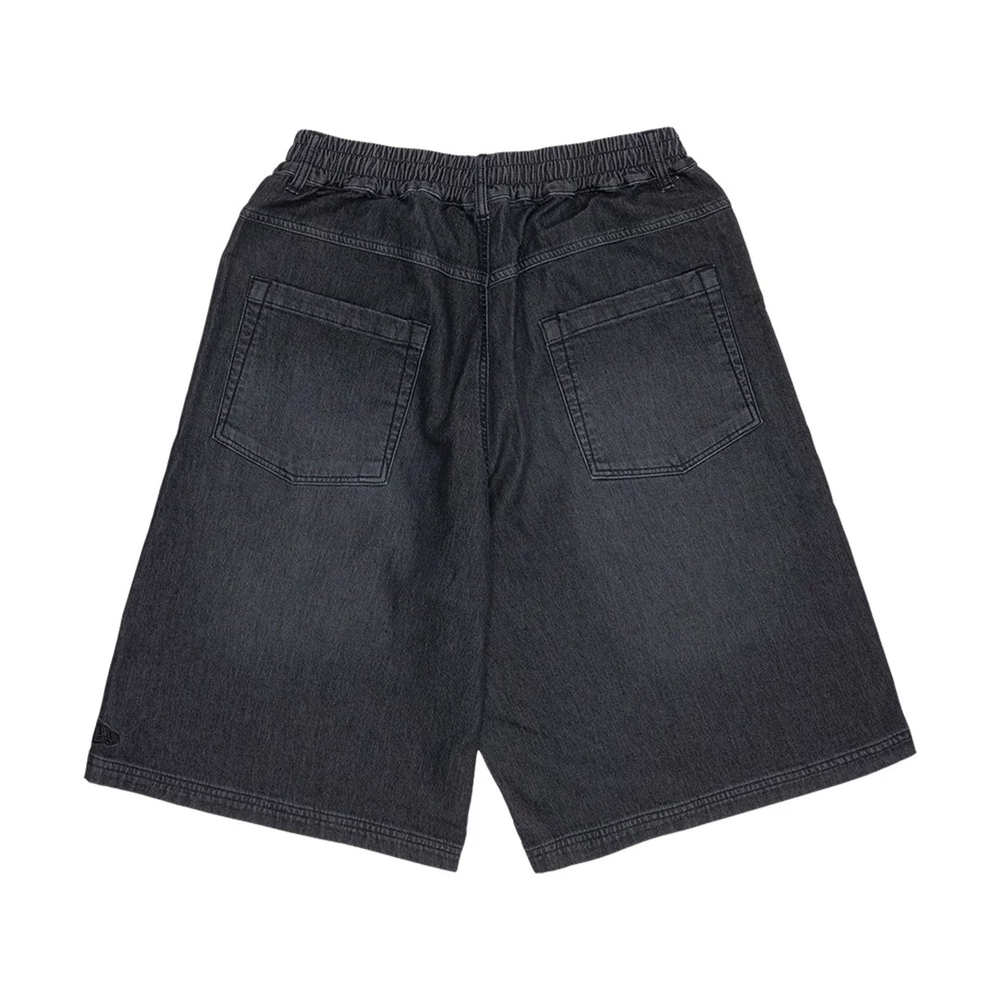 The model is wearing this New Era Washed Bermuda Shorts in black. 2