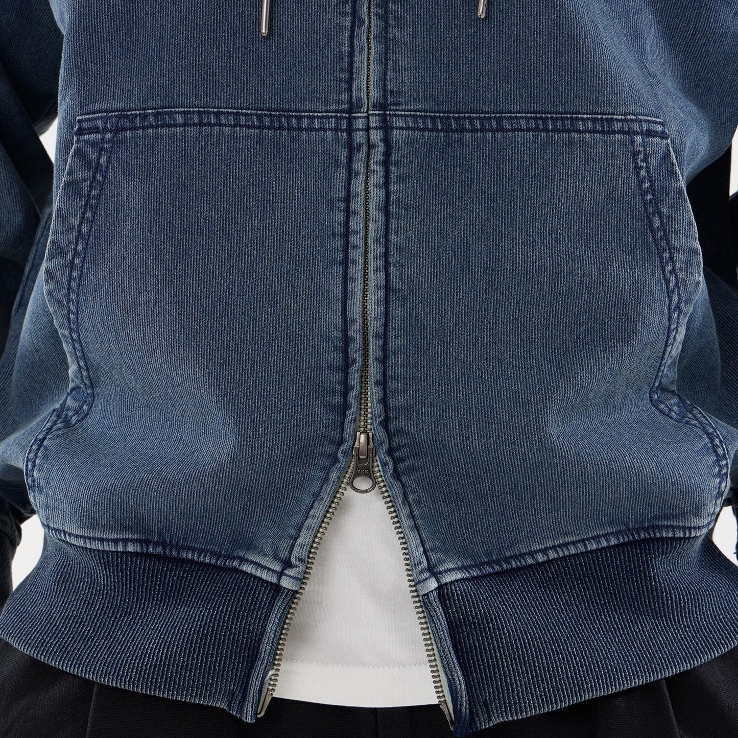 The model is wearing this New Era Washed Full Zip Hoodie in blue. 6