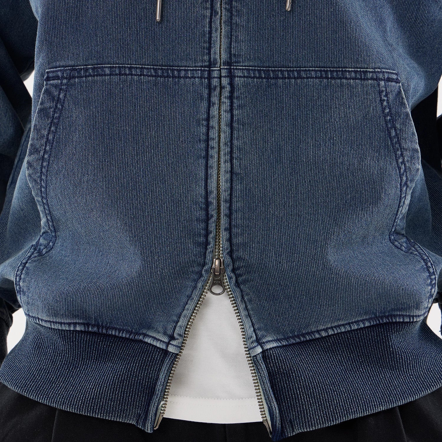 The model is wearing this New Era Washed Full Zip Hoodie in blue. 6