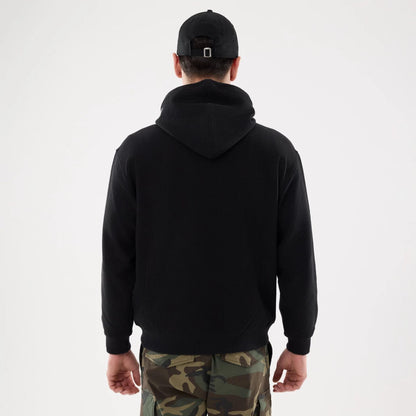 The model is wearing this New Era Waffle Full Zip Hoodie in black. 2
