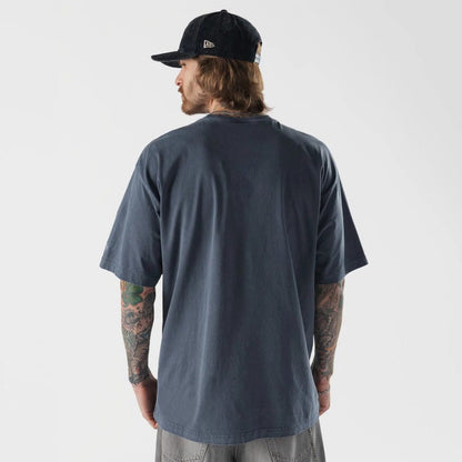 The model is wearing this New Era Originators T-Shirt in navy. 2