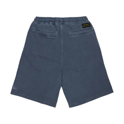 The model is wearing this New Era Originators Oversized Shorts in navy. 2