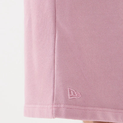 The model is wearing this New Era Originators Oversized Shorts in pink. 6
