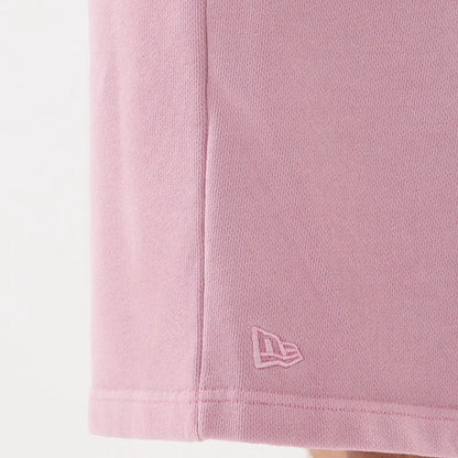 The model is wearing this New Era Originators Oversized Shorts in pink. 6
