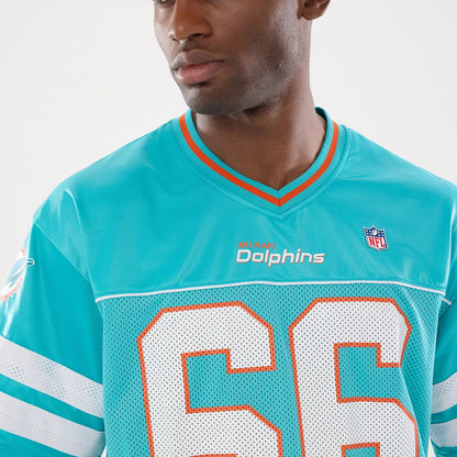 The model is wearing this NFL Miami Dolphins Mesh Jersey in turquoise. 6
