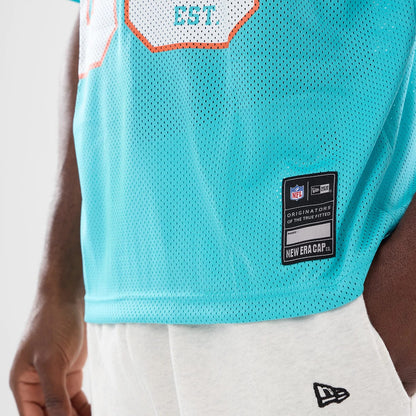 The model is wearing this NFL Miami Dolphins Mesh Jersey in turquoise. 4
