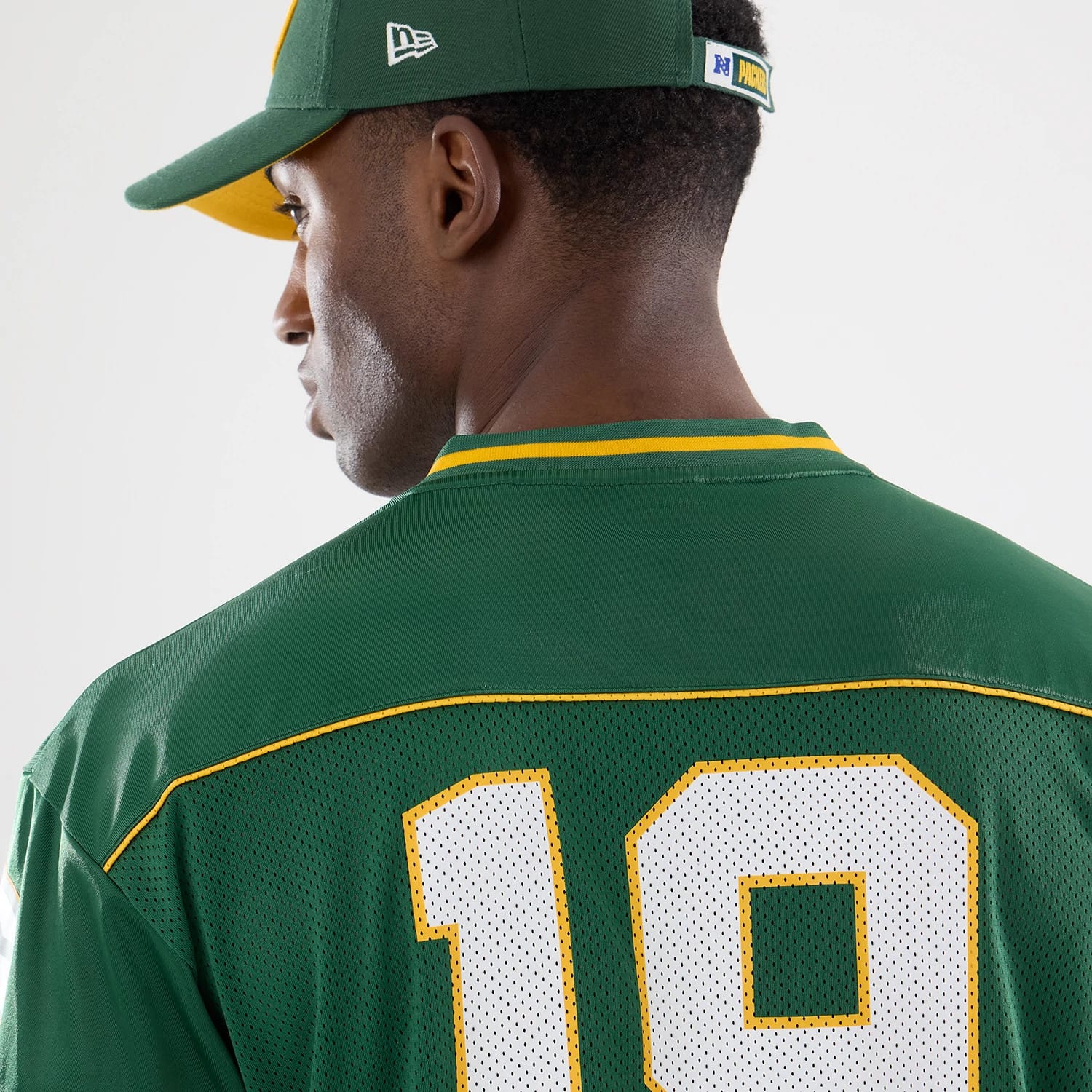 The model is wearing this NFL Green Bay Packers Mesh Jersey in green. 5