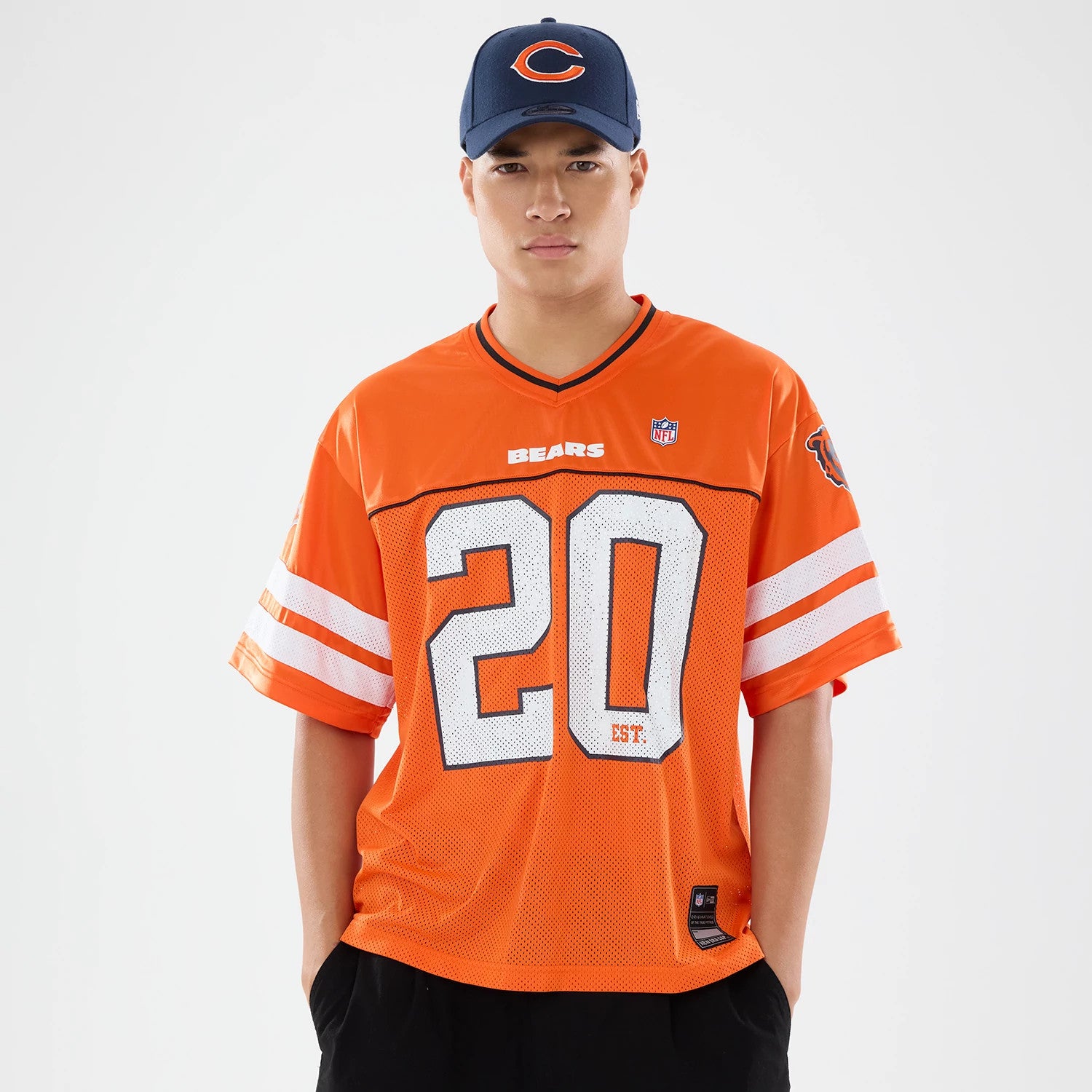 The model is wearing this NFL Chicago Bears Mesh Jersey in orange. 1