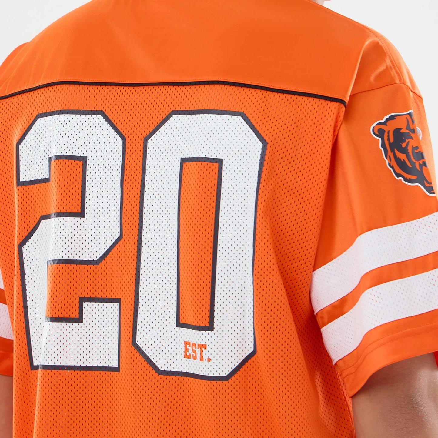 The model is wearing this NFL Chicago Bears Mesh Jersey in orange. 5
