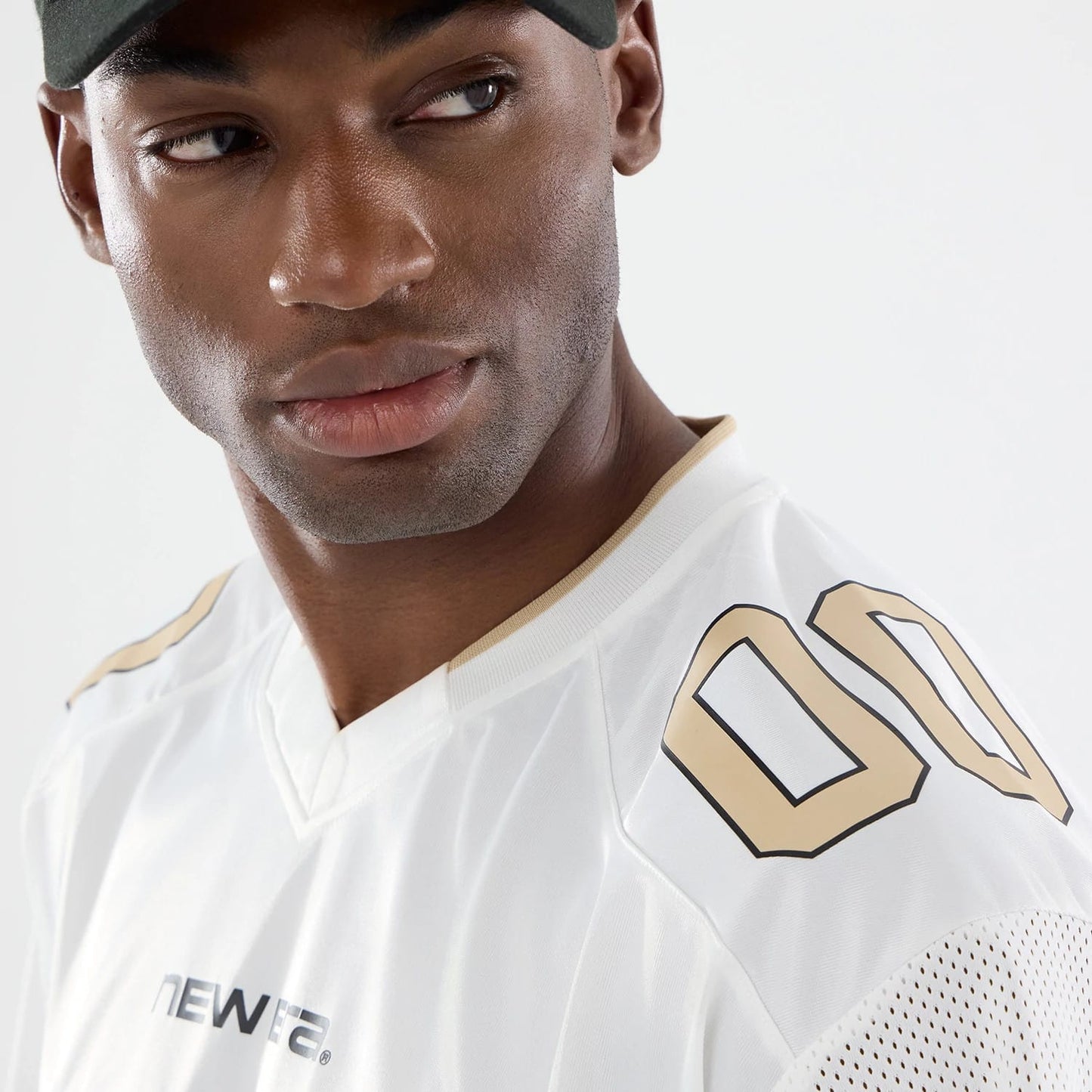 The model is wearing this New Era 1920 Mesh Jersey in white. 4