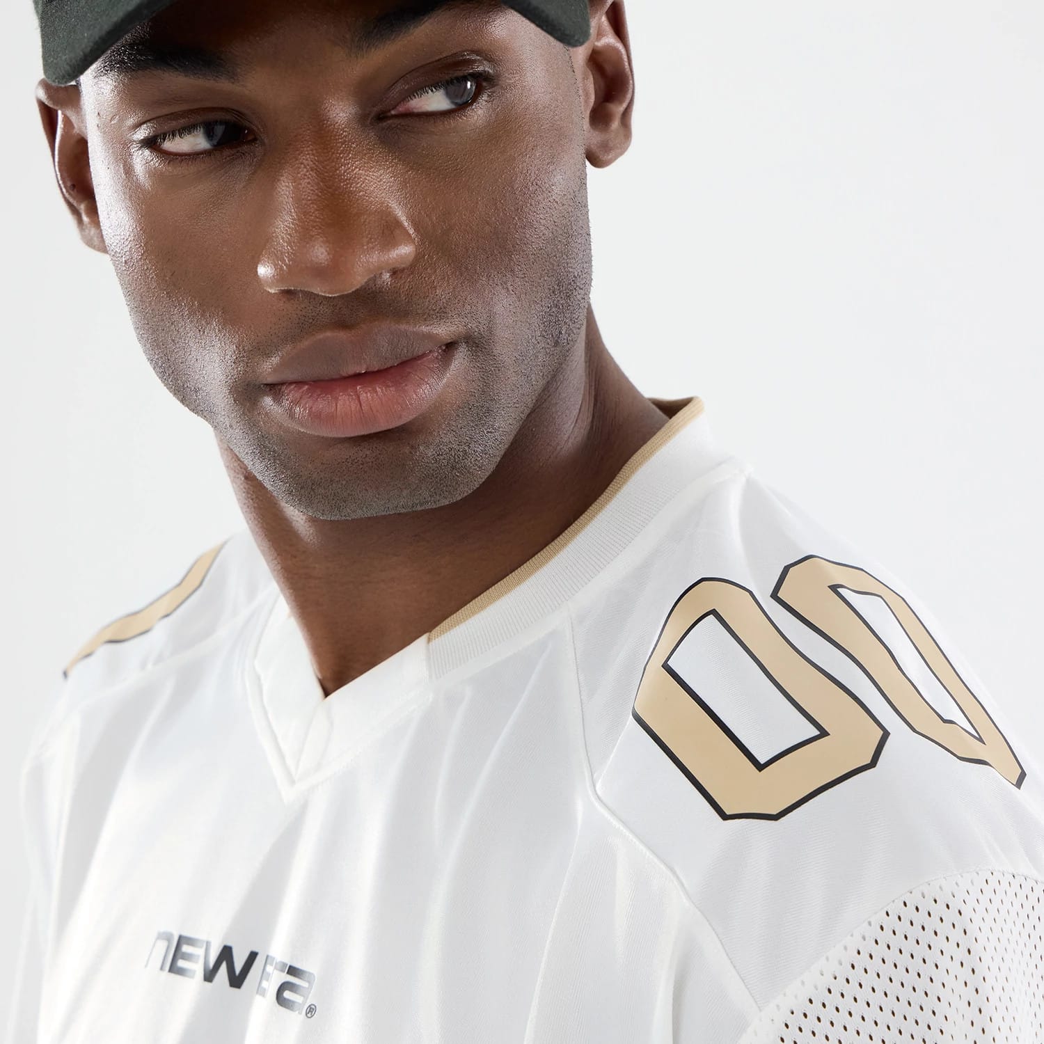 The model is wearing this New Era 1920 Mesh Jersey in white. 4