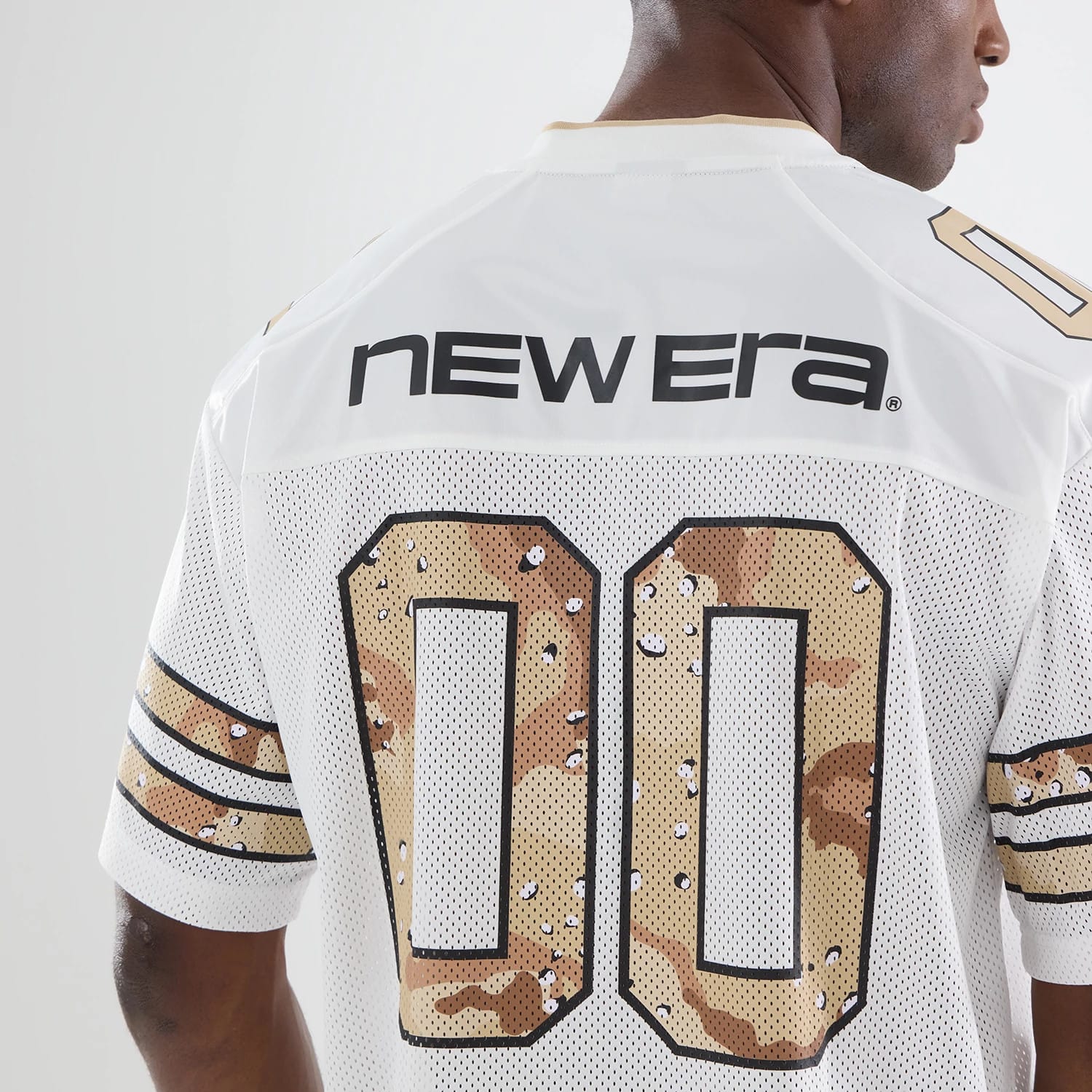 The model is wearing this New Era 1920 Mesh Jersey in white. 5
