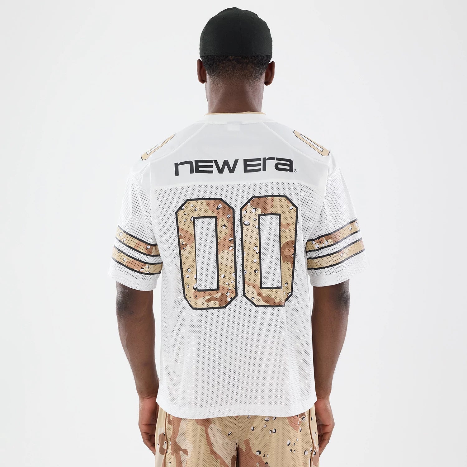 The model is wearing this New Era 1920 Mesh Jersey in white. 2