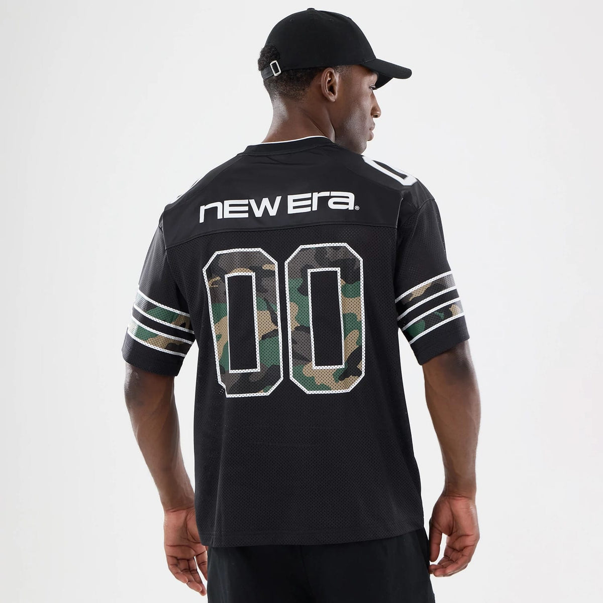 The model is wearing this New Era 1920 Mesh Jersey in black. 2
