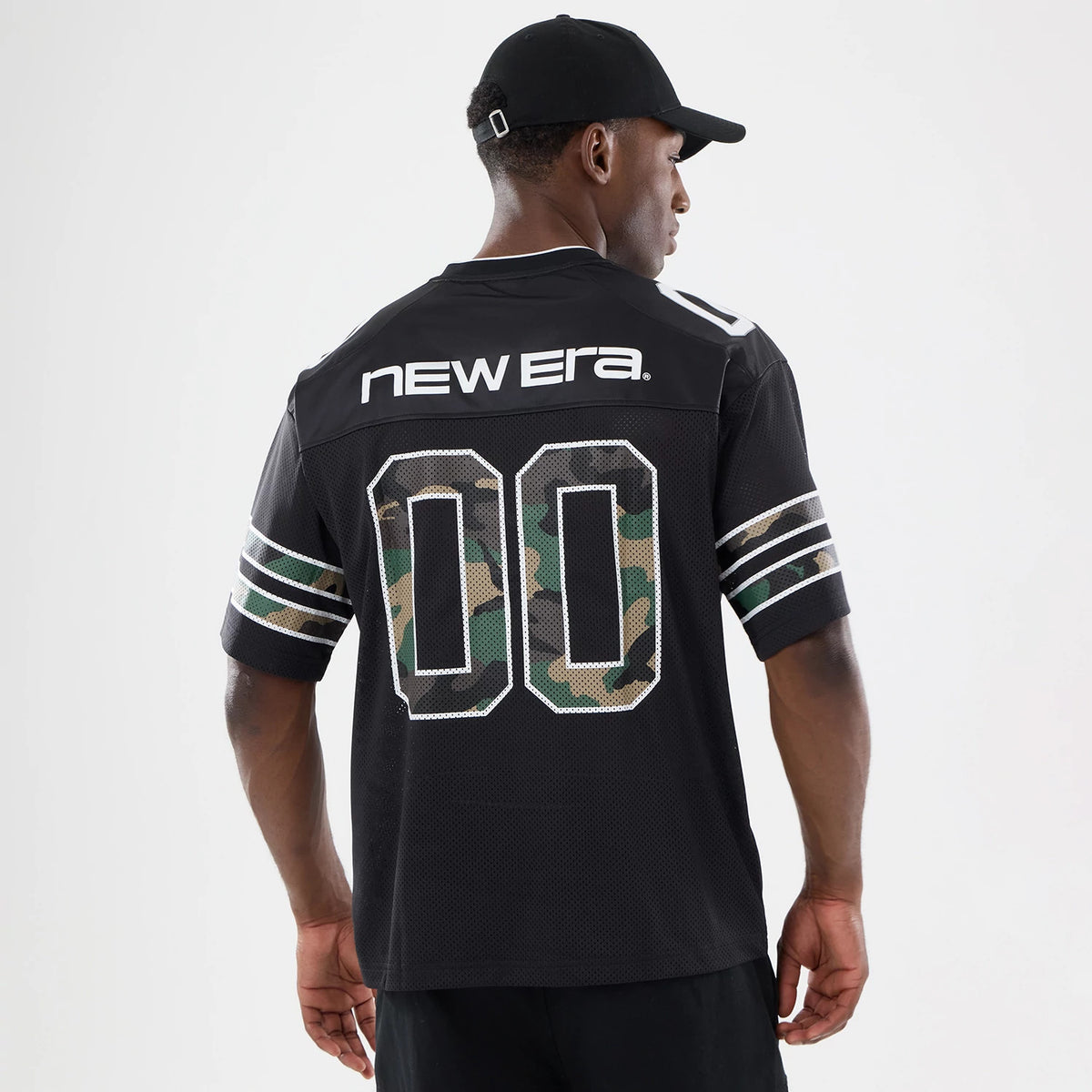 The model is wearing this New Era 1920 Mesh Jersey in black. 2