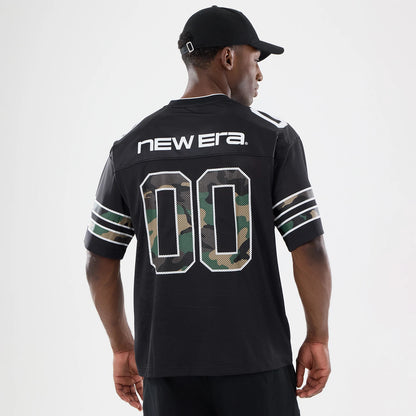 The model is wearing this New Era 1920 Mesh Jersey in black. 2