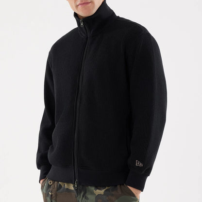The model is wearing this New Era Black Label Jacket in black. 3