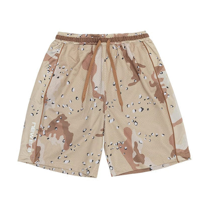 The model is wearing this New Era Bermuda Oversized Shorts in Woodland Camo. 7