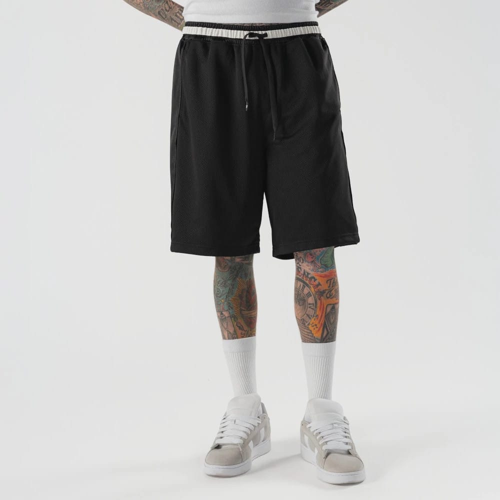 New Era Bermuda Black Oversized Shorts | NEC EU