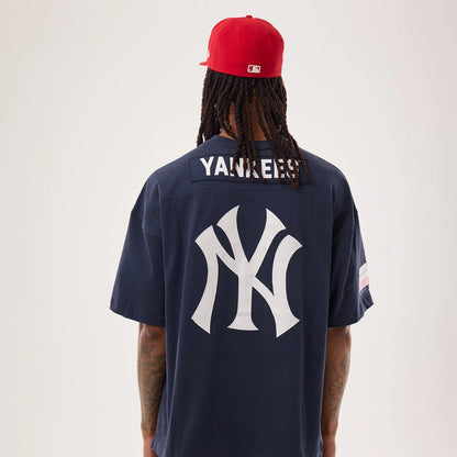The model is wearing this MLB Fan Family New York Yankees Jersey in navy. 2