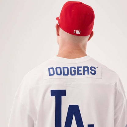 The model is wearing this MLB Fan Family Los Angeles Dodgers Jersey in white. 7