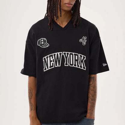 The model is wearing this New Era Fan Family Jersey in black. 3