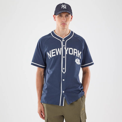 The model is wearing this New Era New York Jersey in navy. 1