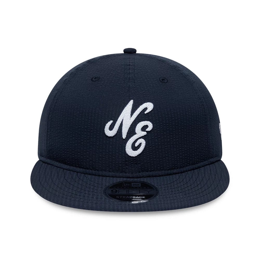 Pictured is this New Era Seersucker Retro Crown 9FIFTY cap in navy. 2