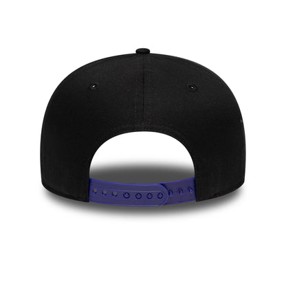 Toronto Raptors NBA Hardwood Classic Black New Era 9FIFTY Snapback Adjustable Cap, rear view showing a purple adjustable snap closure on the black crown, with evenly spaced black eyelets and a centred top button.