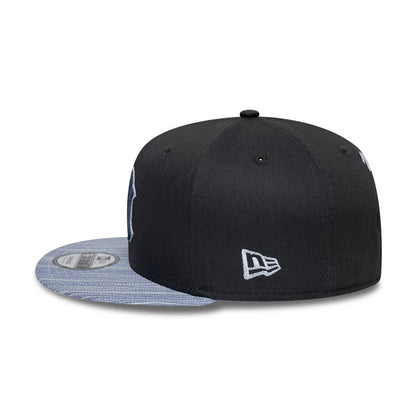 Pictured is this MLB Denim Patchwork New York Yankees 9FIFTY Snapback cap in black. 5