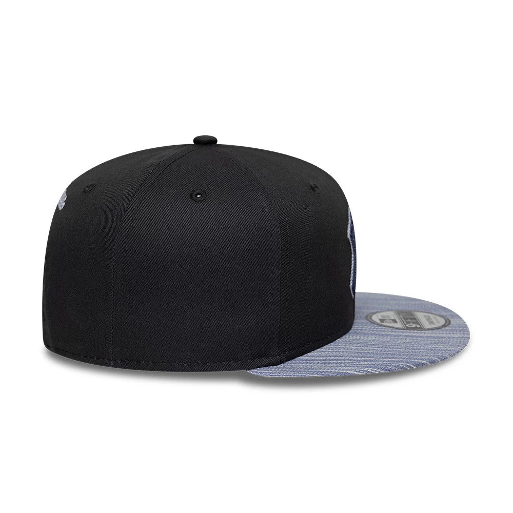 Pictured is this MLB Denim Patchwork New York Yankees 9FIFTY Snapback cap in black. 7
