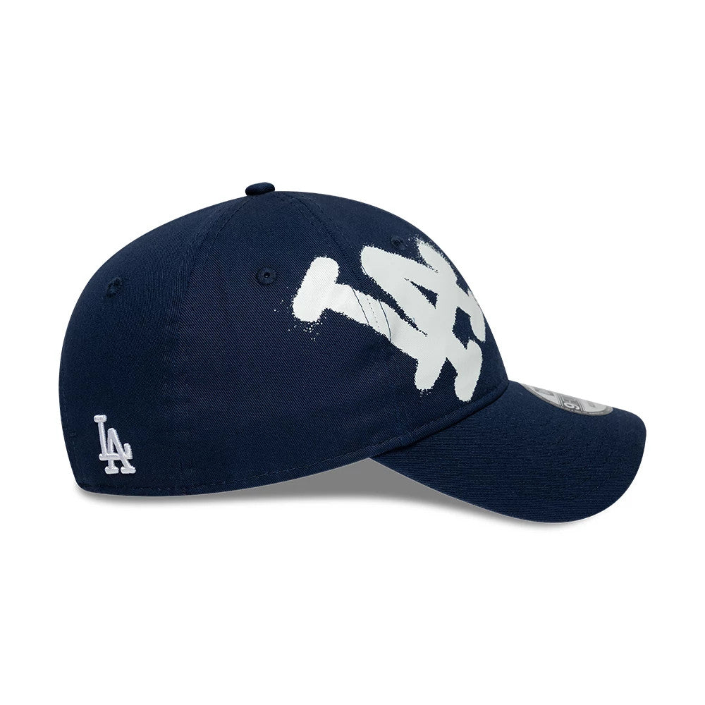 Pictured is this MLB Spray Paint LA Dodgers 9FORTY cap in dark blue. 4