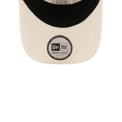 Pictured is this NFL X Bad Bunny All Over Logos Casual Classic cap in cream. 7