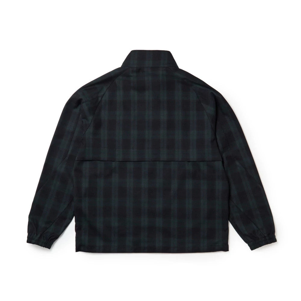 The model is wearing this New Era Blouson Plaid Windbreaker Jacket in Navy. 8