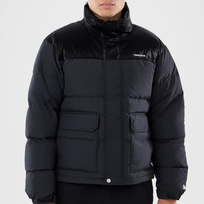 The model is wearing this New Era Down Jacket in black. 3